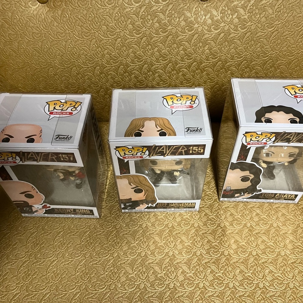 Never opened SLAYER POP ROCKS vinyl figures. Perfect condition.